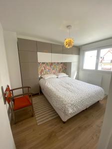 Katil atau katil-katil dalam bilik di L’Abri Cotier - Appartement face mer 2/4 personnes