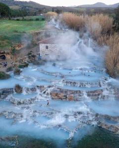 an aerial view of a river with people swimming in it at Appartamento Capanne in Capanne