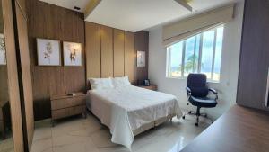 Кровать или кровати в номере Luxo vista Mar Copacabana