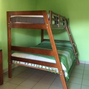 a couple of bunk beds in a room at Casa LEONOR in Oaxaca City
