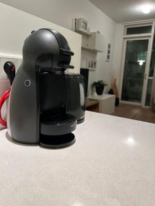 a coffee maker sitting on top of a kitchen counter at Reykjavikrental in Reykjavík