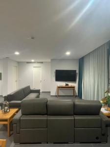 TV a/nebo společenská místnost v ubytování Whalesbay Hotel Apartamentos