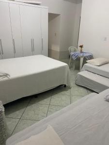 Giường trong phòng chung tại Espaço Verde