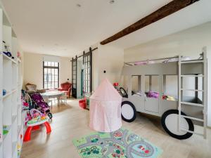 a room with a bedroom with bunk beds at Luxurious 5-star house in Limburg with jacuzzi, a paradise for families in Bree
