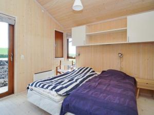 Postel nebo postele na pokoji v ubytování Holiday home Store Fuglede XXVI