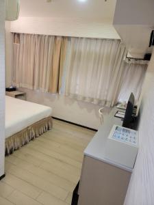 Ein Bett oder Betten in einem Zimmer der Unterkunft Mingle With The Star