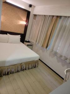 Ein Bett oder Betten in einem Zimmer der Unterkunft Mingle With The Star