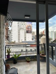 a view of a city skyline from a balcony at Artur in Buenos Aires
