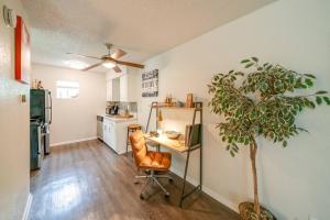a room with a desk and a plant in it at The Joplin House - Austin - Zilker Park Studio in Austin