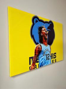 a painting of a basketball player on a yellow wall at Luxury Midtown Flats near Downtown Memphis & FedEx Forum in Memphis