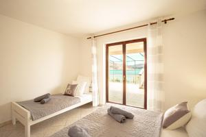 เตียงในห้องที่ Bepic Quiet location on a beautiful bay
