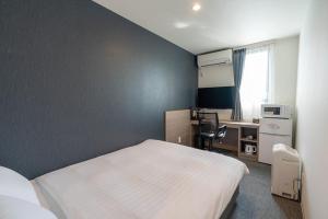 TV a/nebo společenská místnost v ubytování HOTEL R9 The Yard Yuki