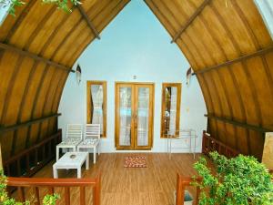 Posezení v ubytování Uki village bungalows