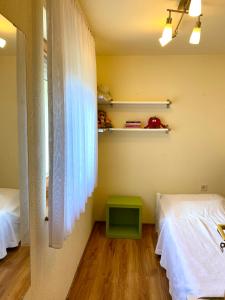 Posteľ alebo postele v izbe v ubytovaní Cili's Apartments Vonyarcvashegy Balaton