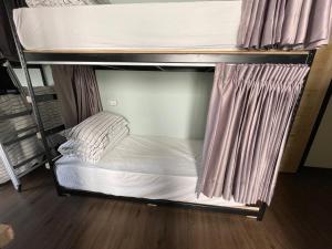 Letto o letti in una camera di HeMei Homestay