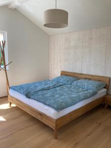 Posteľ alebo postele v izbe v ubytovaní Lagom Haus