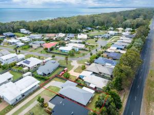 an aerial view of a small town with buildings at Breeze in Toogoom in Toogoom