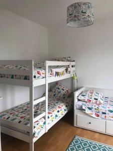 Posteľ alebo postele v izbe v ubytovaní La Maison Familiale Ladou