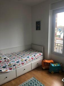 Posteľ alebo postele v izbe v ubytovaní La Maison Familiale Ladou