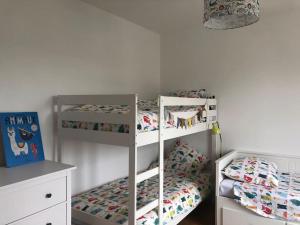 Posteľ alebo postele v izbe v ubytovaní La Maison Familiale Ladou