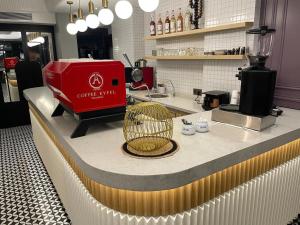 a red appliance sitting on top of a counter at Hotel Eyfel in Istanbul