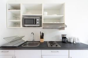 Køkken eller tekøkken på 1Br Poolside Apartment, Long Beach, Lanta Sport Resort 104