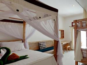 Ein Bett oder Betten in einem Zimmer der Unterkunft Sama Sama Amed