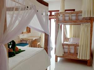 Ein Bett oder Betten in einem Zimmer der Unterkunft Sama Sama Amed