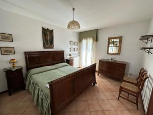 Postel nebo postele na pokoji v ubytování A Villa Esperia Bed and Breakfast