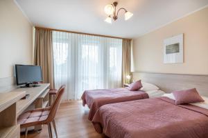 TV a/nebo společenská místnost v ubytování Lech Resort & Spa