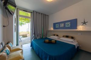 Posteľ alebo postele v izbe v ubytovaní Villa Diamante Costa dei trabocchi Vasto