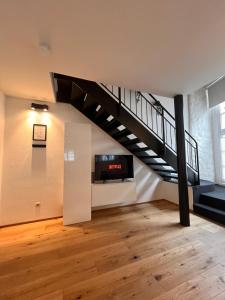 TV a/nebo společenská místnost v ubytování Apartment Ritter Ramm - Holiday Living