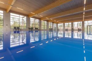 Πισίνα στο ή κοντά στο Fletcher Familiehotel De Hunzebergen