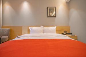 Gloucester Hotel Cheongju客房内的一张或多张床位