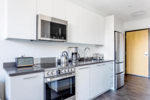 A kitchen or kitchenette at Central Sq Studio w Doorman nr Charles River BOS-312
