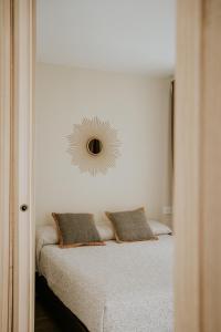 Posteľ alebo postele v izbe v ubytovaní Apartamentos Levante - Mares