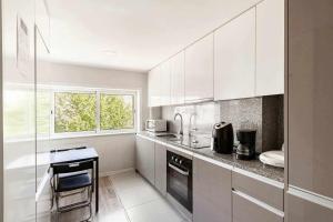 Η κουζίνα ή μικρή κουζίνα στο Bossa Nova GuestHouse