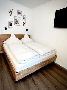 Postel nebo postele na pokoji v ubytování Studio Nebelhorn