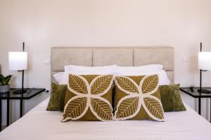 מיטה או מיטות בחדר ב-Villa Ellania