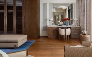 a living room with a vanity and a mirror at The Ritz-Carlton, Baku in Baku