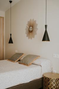 Posteľ alebo postele v izbe v ubytovaní Apartamentos Levante - Mares