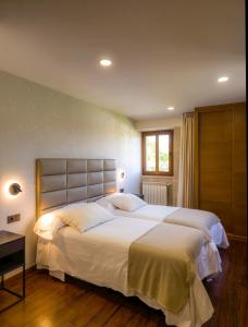 Postelja oz. postelje v sobi nastanitve Casa Rural Camino Real Completa