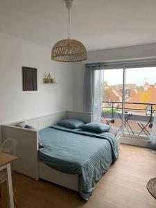 Posteľ alebo postele v izbe v ubytovaní Appartement T2 - 50m de la Mer - Parking - Wifi