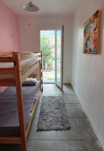 Łóżko lub łóżka w pokoju w obiekcie Maison sur mer Palavas