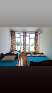 Postel nebo postele na pokoji v ubytování Joksimović apartmani