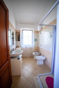 Ένα μπάνιο στο Villa Ottavio - SHARDAN-APARTMENTS