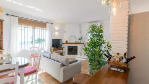 Telewizja i/lub zestaw kina domowego w obiekcie Casa Los Almendrales Torrox by Ruralidays