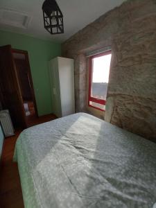 Cama o camas de una habitación en A CASA de FLORINDA