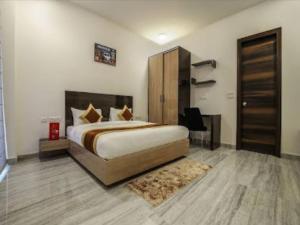 Cama o camas de una habitación en AB Inn Huda City Center