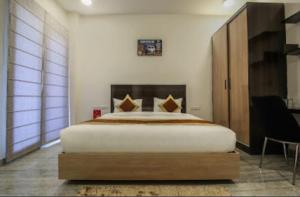 Een bed of bedden in een kamer bij AB Inn Huda City Center
